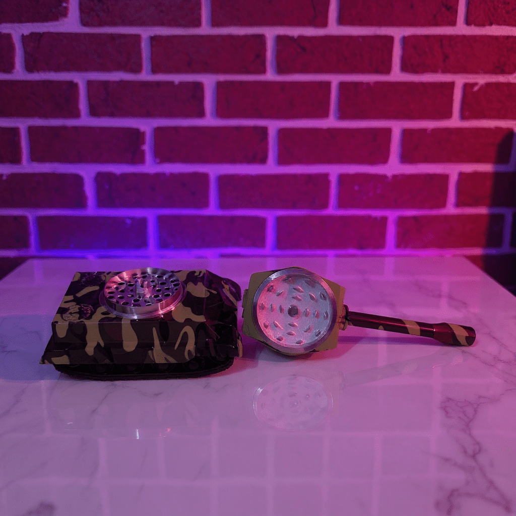 metallic grinder set with camouflage patterns on a reflective surface with a brick wall background.