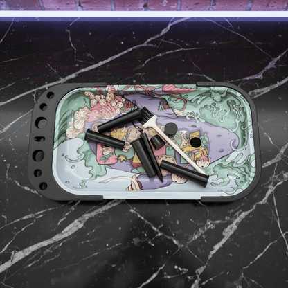Trippy Mushroom Standing Rolling Tray – Psychedelic Prep StationColorful tray with black cylindrical objects on a black marble surface