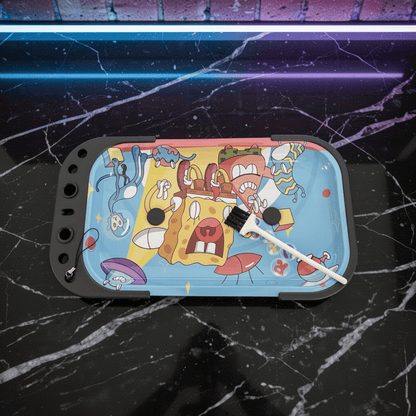 Trippy Sponge Parody Rolling Tray Station – Nostalgic Cartoon Prep Tablerolling tray with cartoon design on a black marble surface